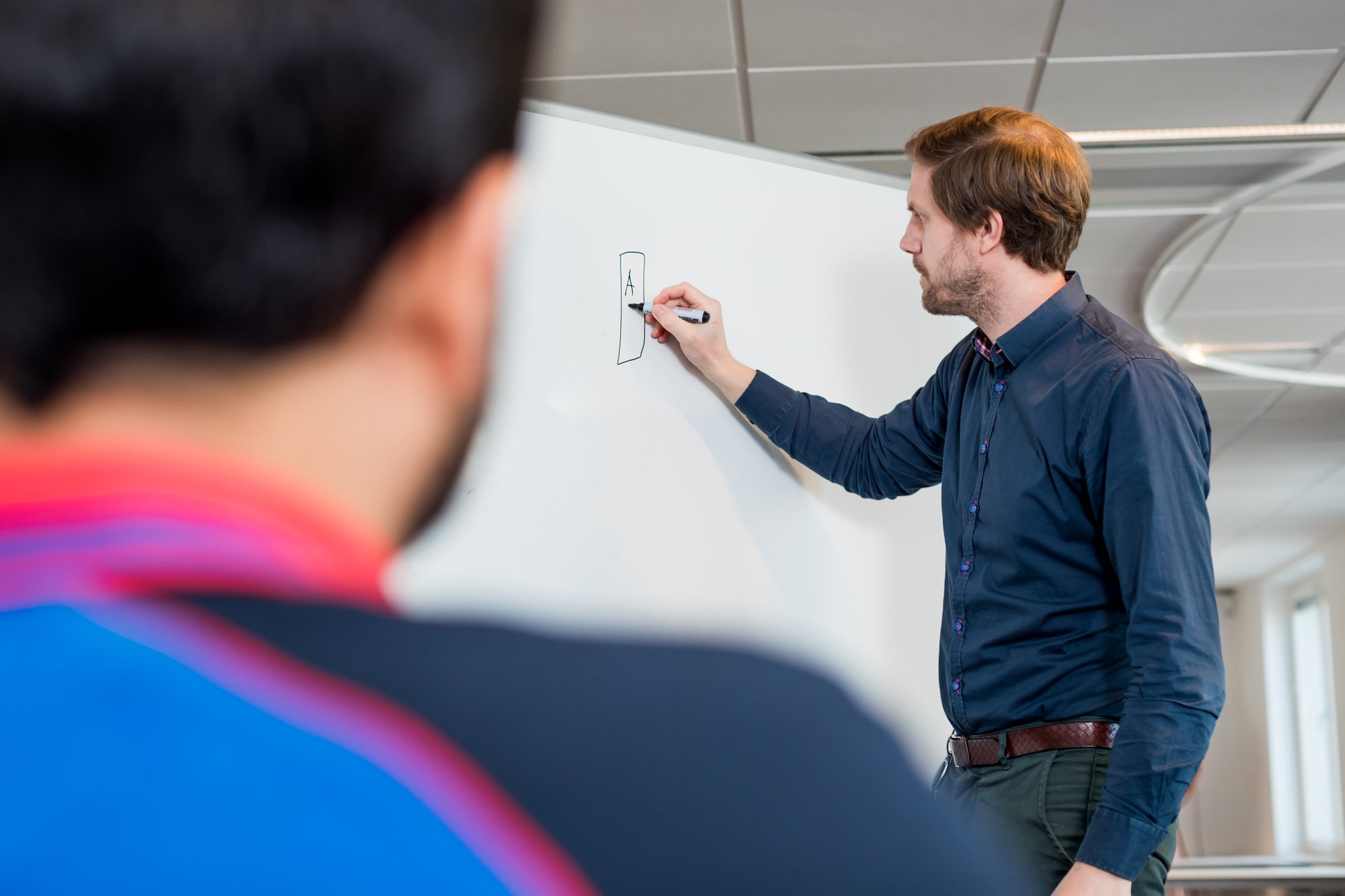 Employees_Man_Whiteboard_Presentation